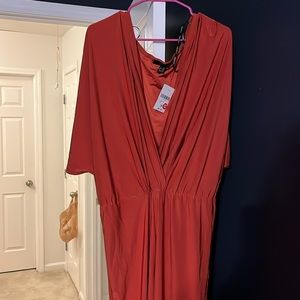 Plus Size VNeck short sleeve jumpsuit. Approx 5ft from collarbone to end of leg